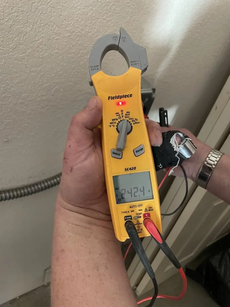 Voltage testing with clamp meter during Electrical Installation Services in Show Low